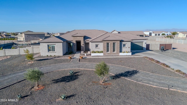 single story home with a garage