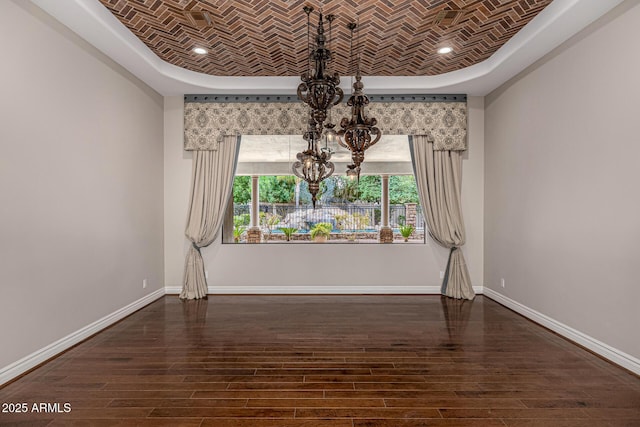 unfurnished dining area with dark hardwood / wood-style floors