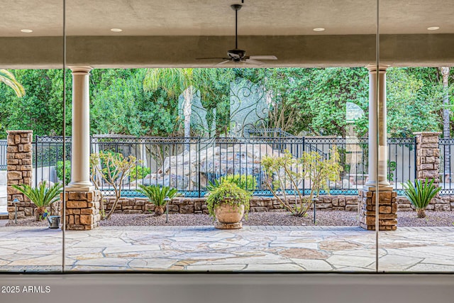 view of patio / terrace featuring ceiling fan