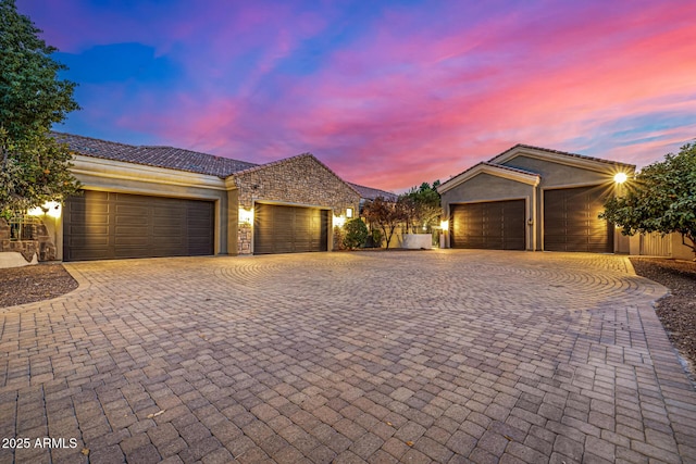 ranch-style home with a garage