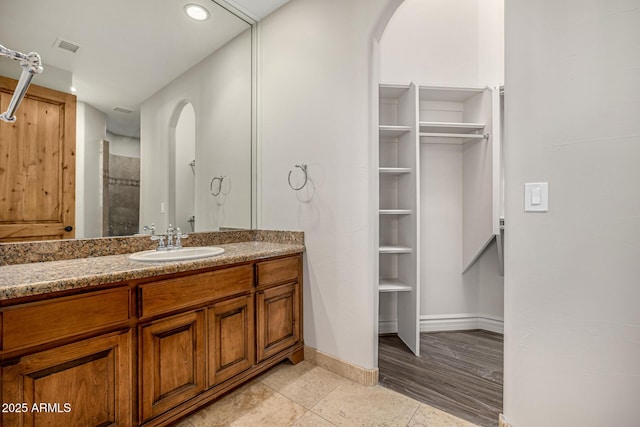 bathroom featuring vanity and tile patterned flooring