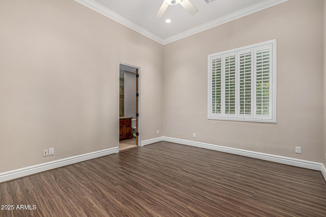 spare room featuring dark wood-type flooring, crown molding, and ceiling fan