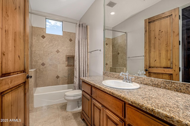 full bathroom with toilet, vanity, and shower / tub combo with curtain