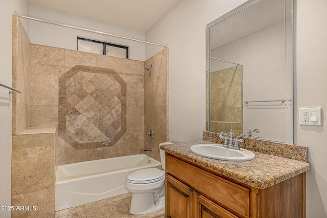 full bathroom with toilet, tiled shower / bath, tile patterned floors, and vanity