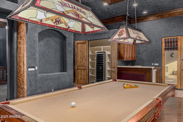 rec room with lofted ceiling, crown molding, pool table, and beverage cooler