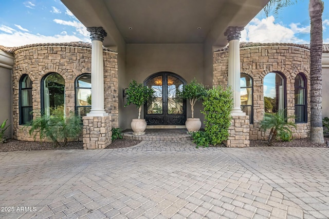 view of exterior entry with french doors