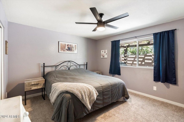 bedroom featuring carpet flooring, ceiling fan, and baseboards