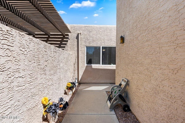 view of side of property with stucco siding