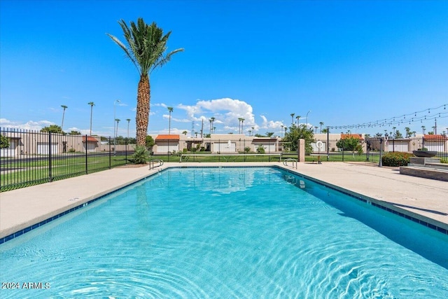 pool featuring fence