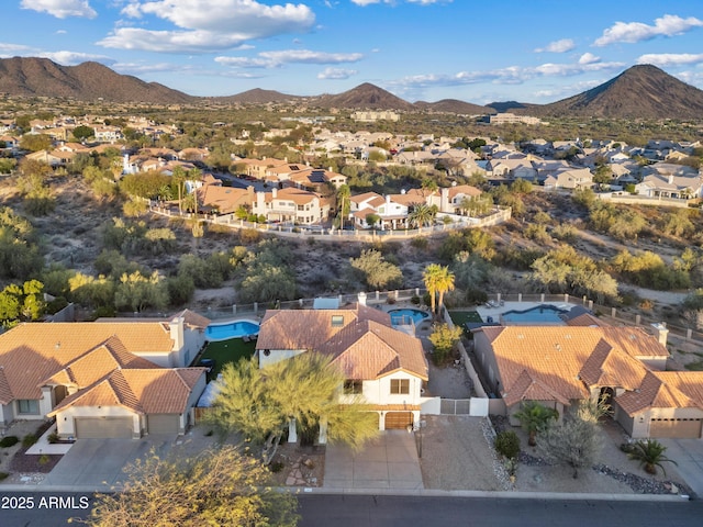 drone / aerial view with a mountain view and a residential view