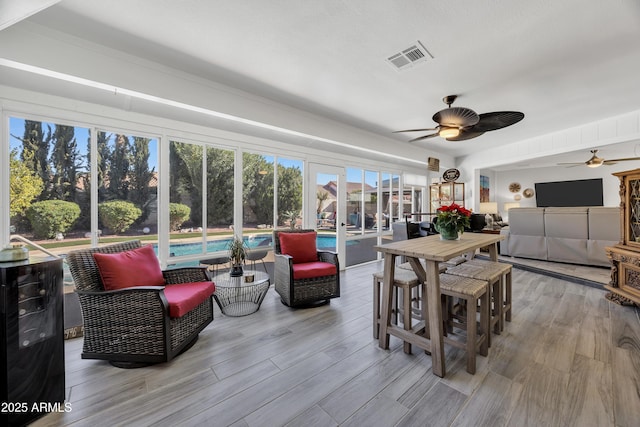 living room featuring ceiling fan