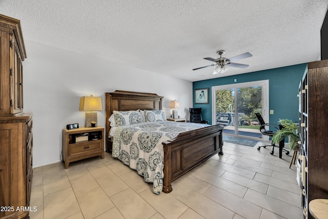 bedroom with access to outside, ceiling fan, light tile patterned flooring, and a textured ceiling