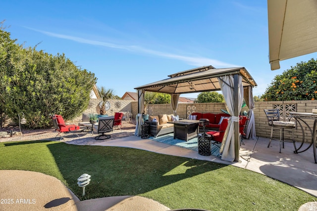 view of patio / terrace with a gazebo and an outdoor living space with a fire pit