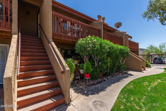 14203 N 19th Ave Unit 2036, Phoenix, AZ 85023 - view of property exterior featuring stairway