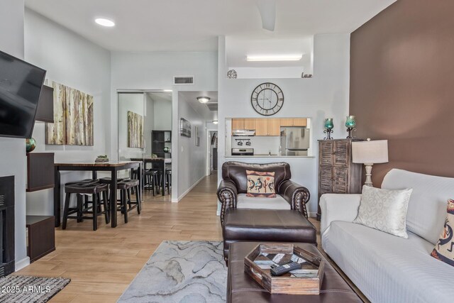 14203 N 19th Ave Unit 2036, Phoenix, AZ 85023 - living area featuring light wood-type flooring