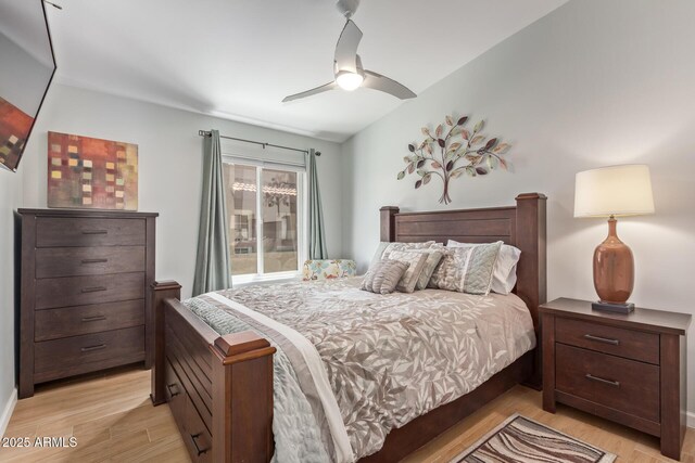 14203 N 19th Ave Unit 2036, Phoenix, AZ 85023 - bedroom featuring light wood-style floors and a ceiling fan