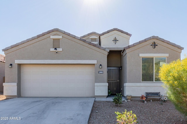 view of front of home with a garage