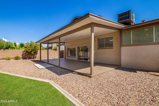 view of patio / terrace featuring fence and cooling unit