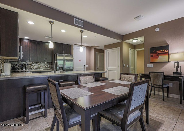 5450 E Deer Valley Dr Unit 2191, Phoenix, AZ 85054 - dining area featuring recessed lighting and light tile patterned floors