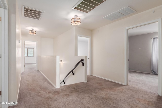 18359 W Eva St, Waddell, AZ 85355 - corridor featuring an upstairs landing, carpet flooring, and baseboards