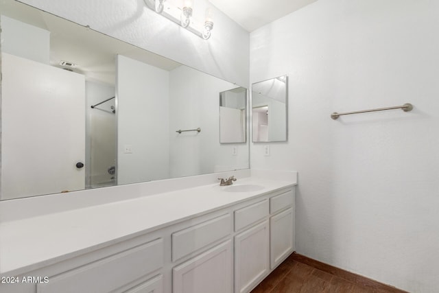 18359 W Eva St, Waddell, AZ 85355 - bathroom with wood finished floors and vanity
