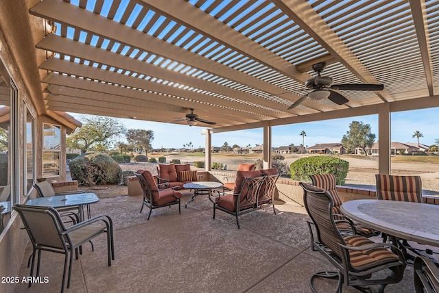 view of patio featuring ceiling fan, an outdoor hangout area, and a pergola