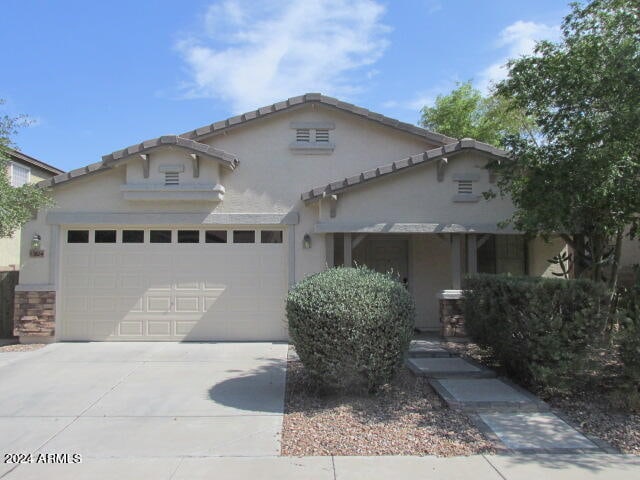 view of front of home featuring a garage