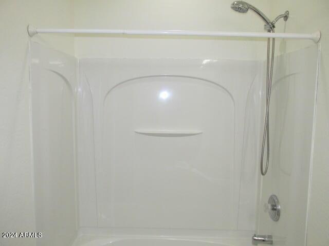 bathroom featuring shower / washtub combination