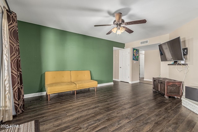 8620 E Sells Dr, Scottsdale, AZ 85251 - sitting room featuring dark wood-style flooring and ceiling fan