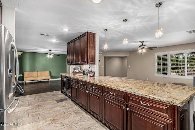 8620 E Sells Dr, Scottsdale, AZ 85251 - kitchen featuring stainless steel refrigerator with ice dispenser, a ceiling fan, recessed lighting, a peninsula, and hanging light fixtures
