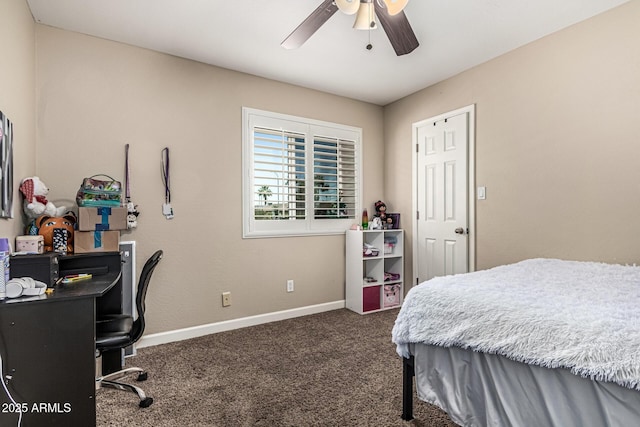 8620 E Sells Dr, Scottsdale, AZ 85251 - carpeted bedroom with baseboards and a ceiling fan