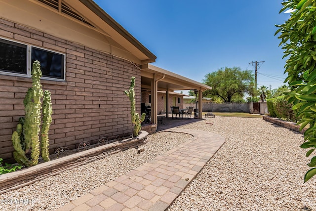 8620 E Sells Dr, Scottsdale, AZ 85251 - fenced backyard with a patio area
