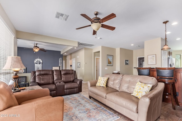 living room with ceiling fan