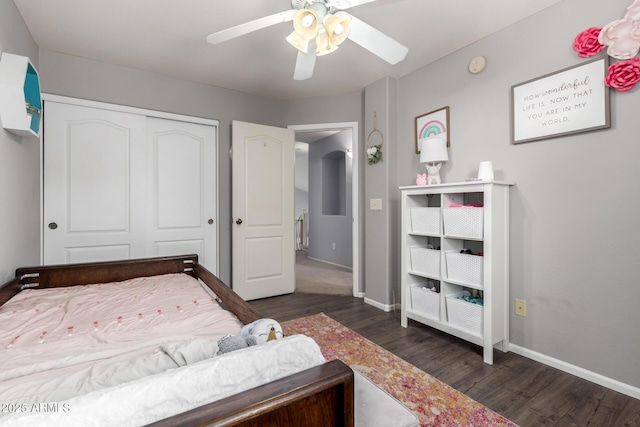 4034 E Mine Shaft Rd, San Tan Valley, AZ 85143 - bedroom with dark wood-type flooring, a closet, baseboards, and ceiling fan
