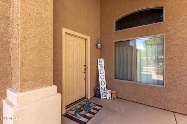 4034 E Mine Shaft Rd, San Tan Valley, AZ 85143 - doorway to property with stucco siding