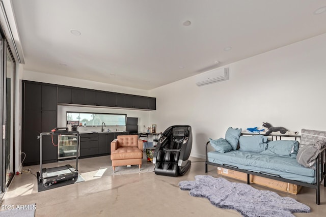 living room featuring a wall unit AC and sink