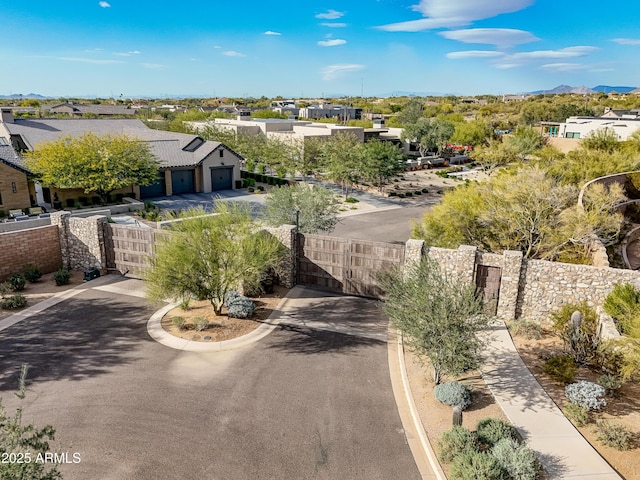 birds eye view of property with a mountain view