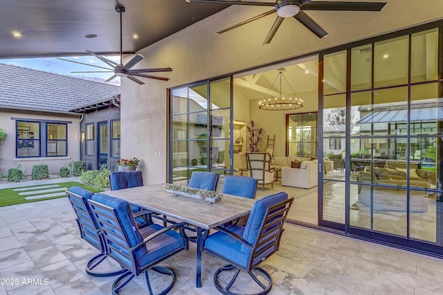 view of patio / terrace featuring ceiling fan