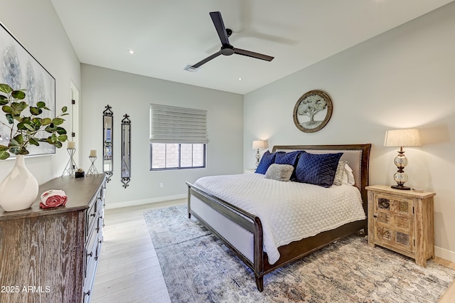 bedroom featuring ceiling fan and hardwood / wood-style floors