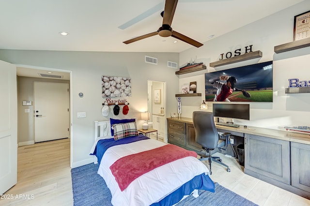 bedroom with ceiling fan, light hardwood / wood-style floors, and lofted ceiling