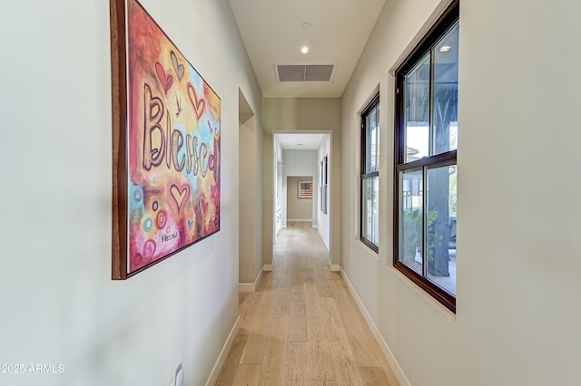 hallway featuring light hardwood / wood-style flooring