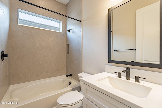 full bathroom featuring bathtub / shower combination, vanity, and toilet