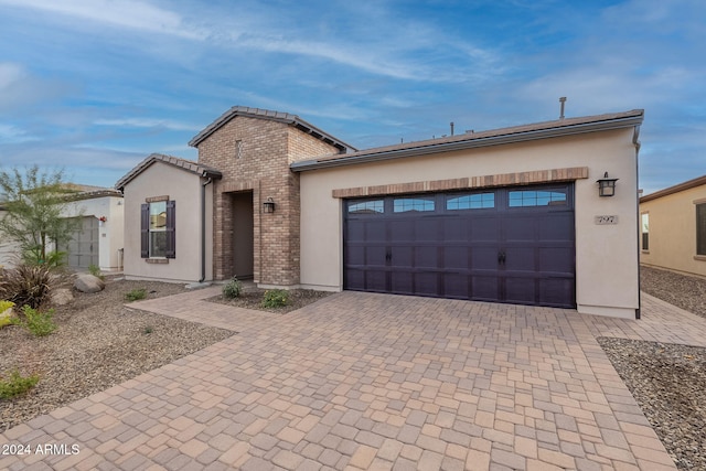 view of front of home with a garage