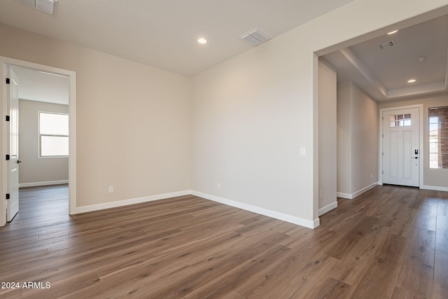 entrance foyer featuring dark hardwood / wood-style floors