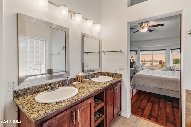 bathroom featuring vanity, ceiling fan, and hardwood / wood-style flooring