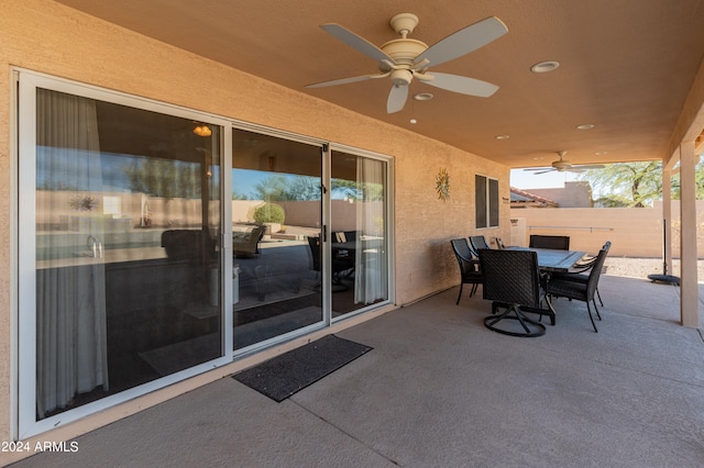 view of patio / terrace featuring ceiling fan