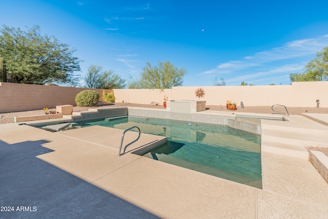 view of swimming pool featuring a patio