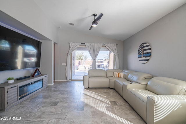 living room with lofted ceiling