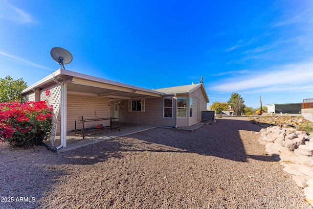 back of house featuring a patio area