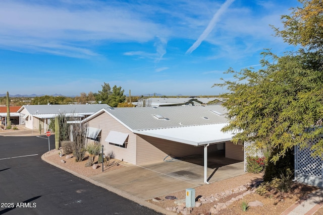 view of front of house with a carport